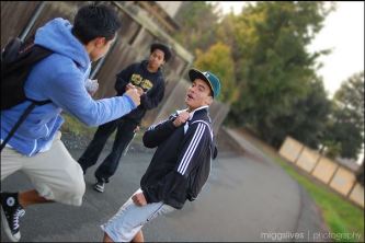 3 young men fighting